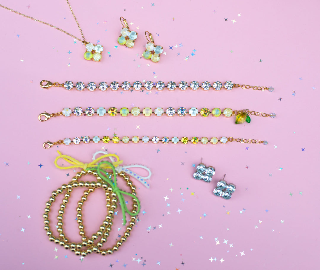 group photo of bracelets, earrings and necklace