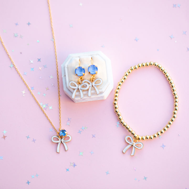 White Bow Charm Stretch Beaded Bracelet - GOLD Setting color