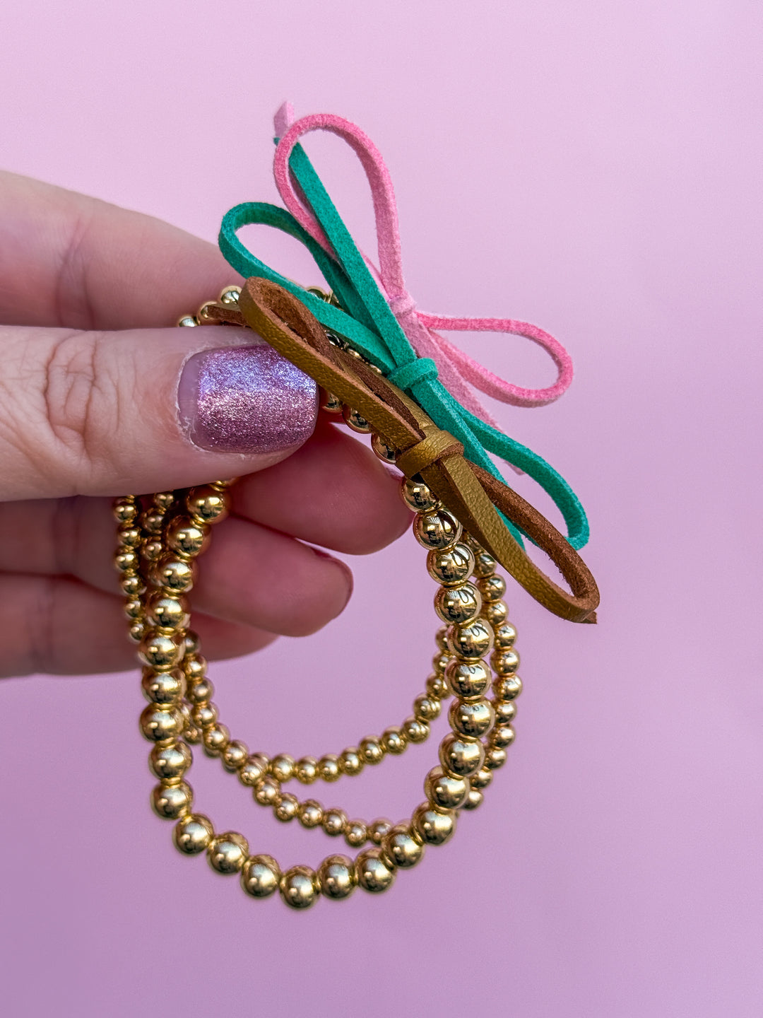 Suede Bow Stretch Beaded Bracelet - Choose setting Color (Pink Goes Good with Green)