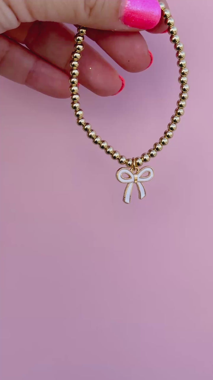 White Bow Charm Stretch Beaded Bracelet - GOLD Setting color