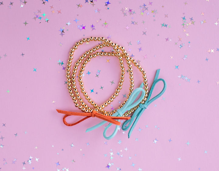 Suede Bow Stretch Beaded Bracelet - Choose setting Color (Showgirl)