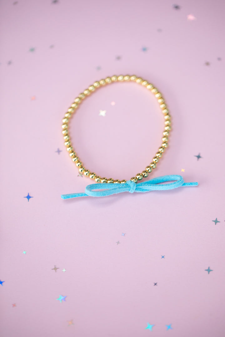 Suede Bow Stretch Beaded Bracelet - Choose setting Color (sparkly friend)