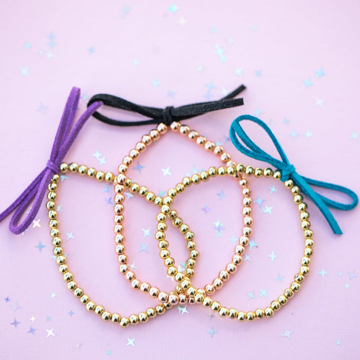 Suede Bow Stretch Beaded Bracelet - Choose setting Color (Moonlit Teal Colors)