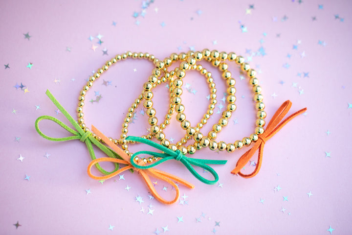 Suede Bow Stretch Beaded Bracelet - Choose setting Color (Cute Orange Bird)
