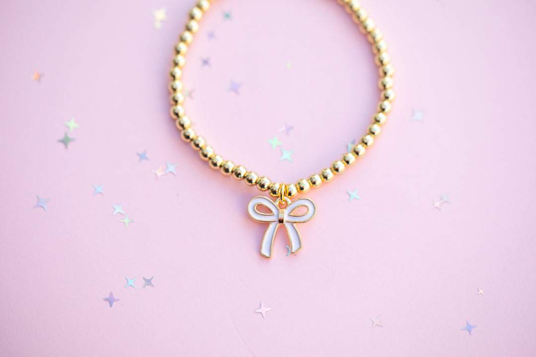 White Bow Charm Stretch Beaded Bracelet - GOLD Setting color