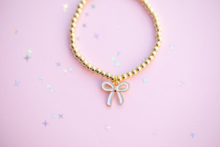 White Bow Charm Stretch Beaded Bracelet - GOLD Setting color