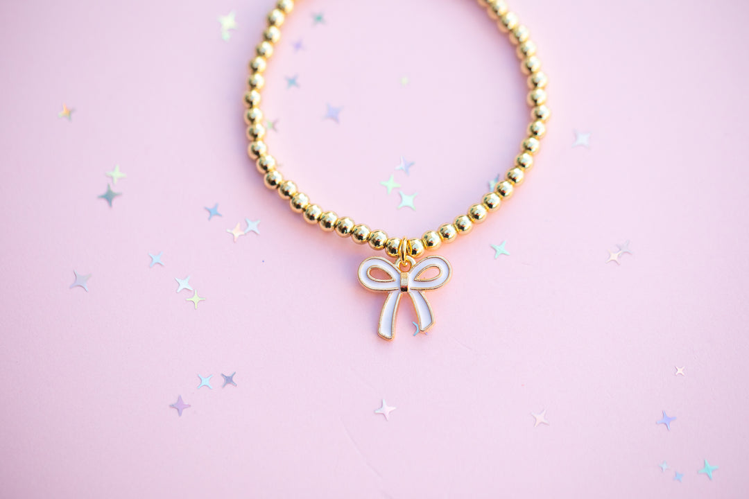 White Bow Charm Stretch Beaded Bracelet - GOLD Setting color